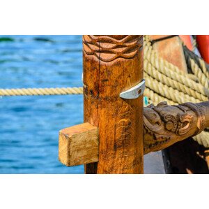 Ilustrace Close-up of a hand carved rudder, Grb, 40 × 26.7 cm
