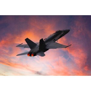 Fotografie Military fighter aircraft in the sky at sunset, fhm, 40 × 26.7 cm