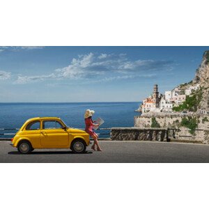 Fotografie Woman holding map leaning on yellow, ac productions, 40 × 22.2 cm